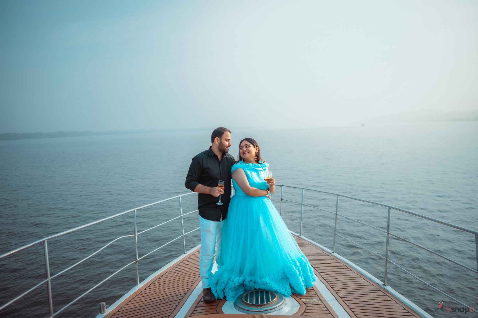 Romantic couple toasting on yacht deck VsnapU photography in Amravati 11.jpg